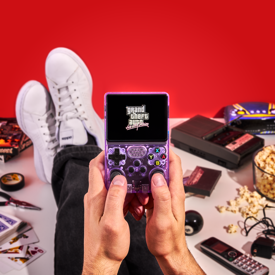 man playing grand theft auto vice city stories on the r36s